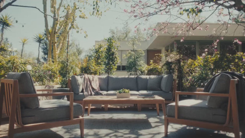 Video showing Outer outdoor sofas with patented OuterShell covers, highlighting cushion protection, water resistance, stain resistance, and family use in outdoor spaces