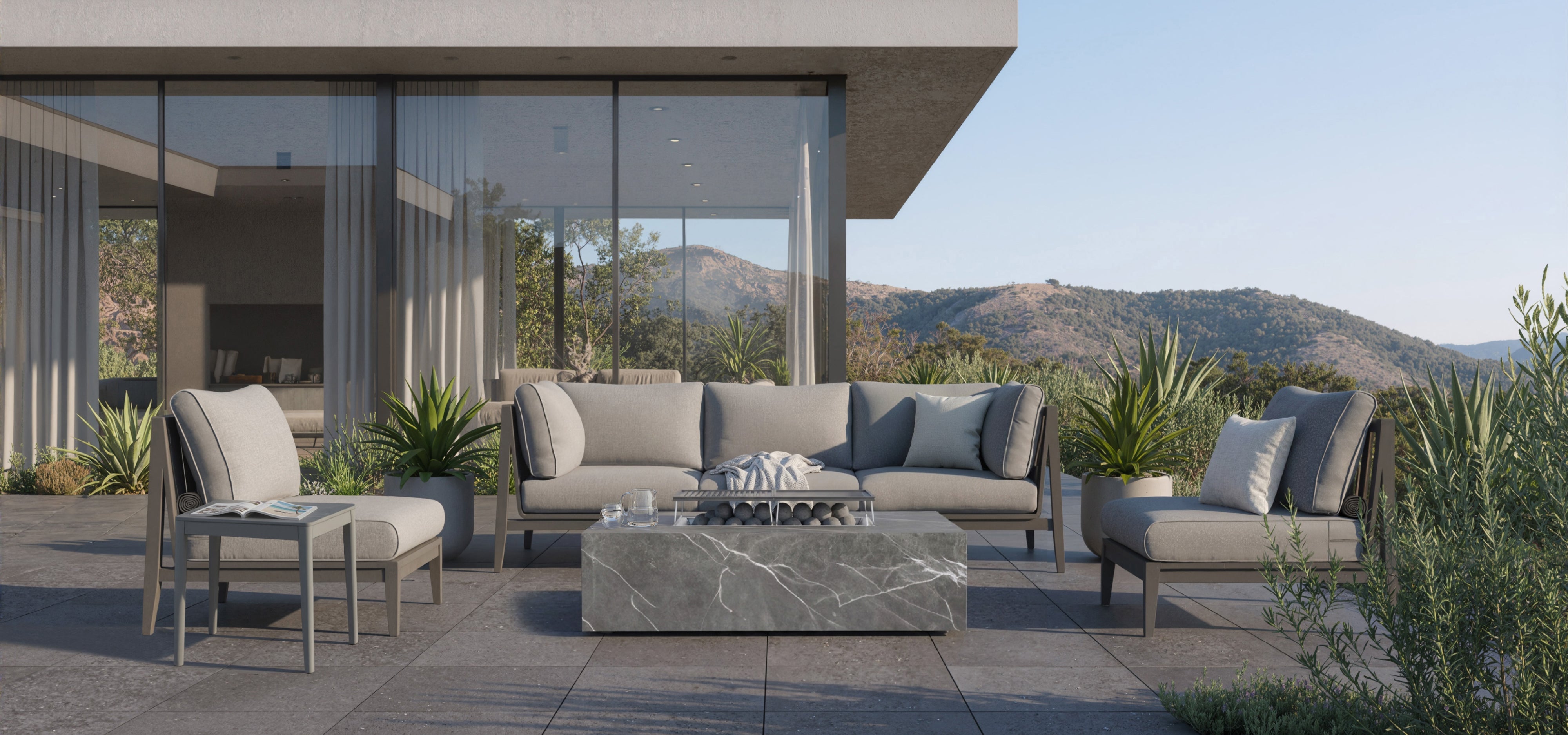 Charcoal aluminum outdoor sofa with armless chairs arranged as a 5-seat patio set