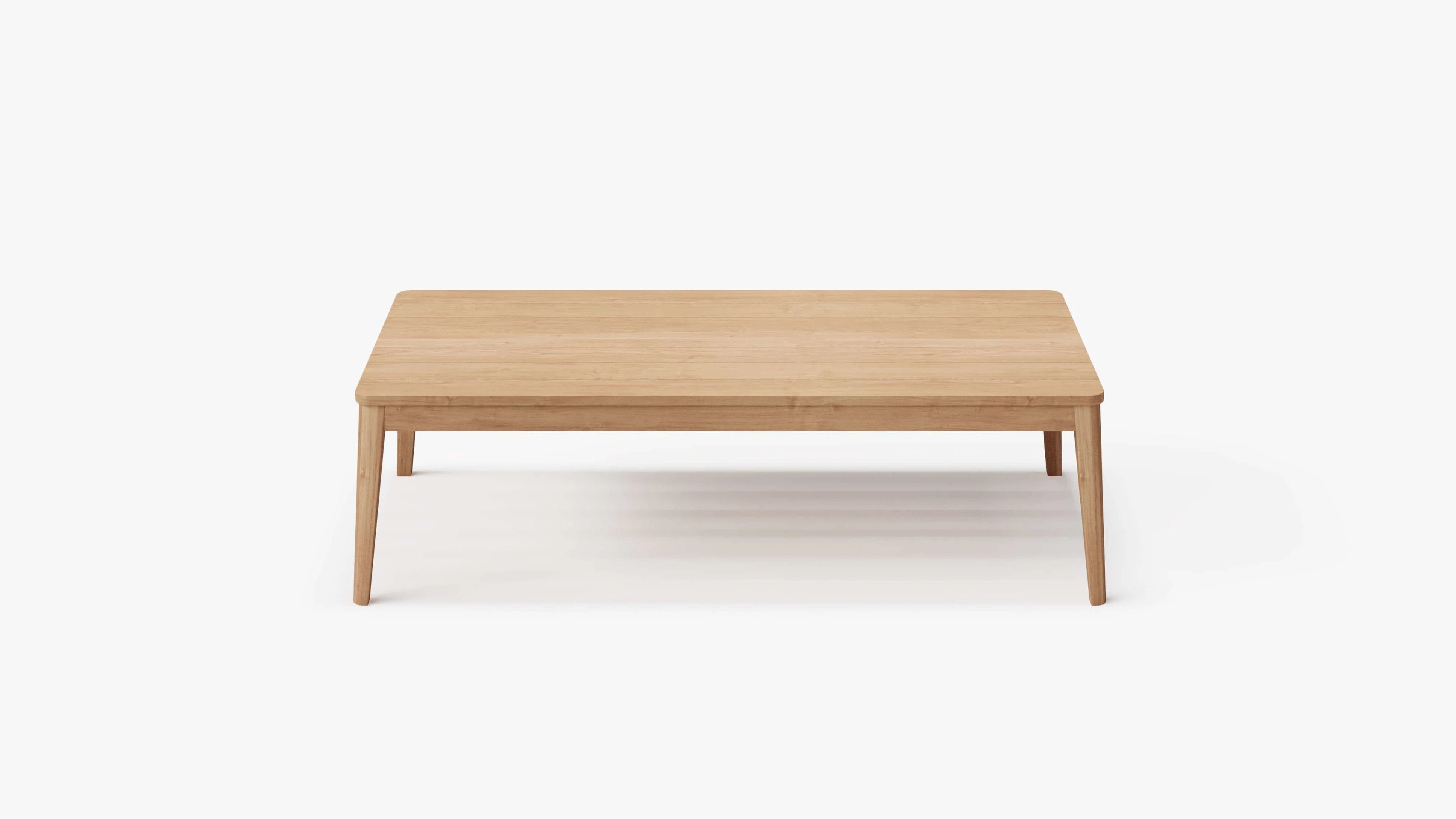 Rectangular teak outdoor coffee table on a white background