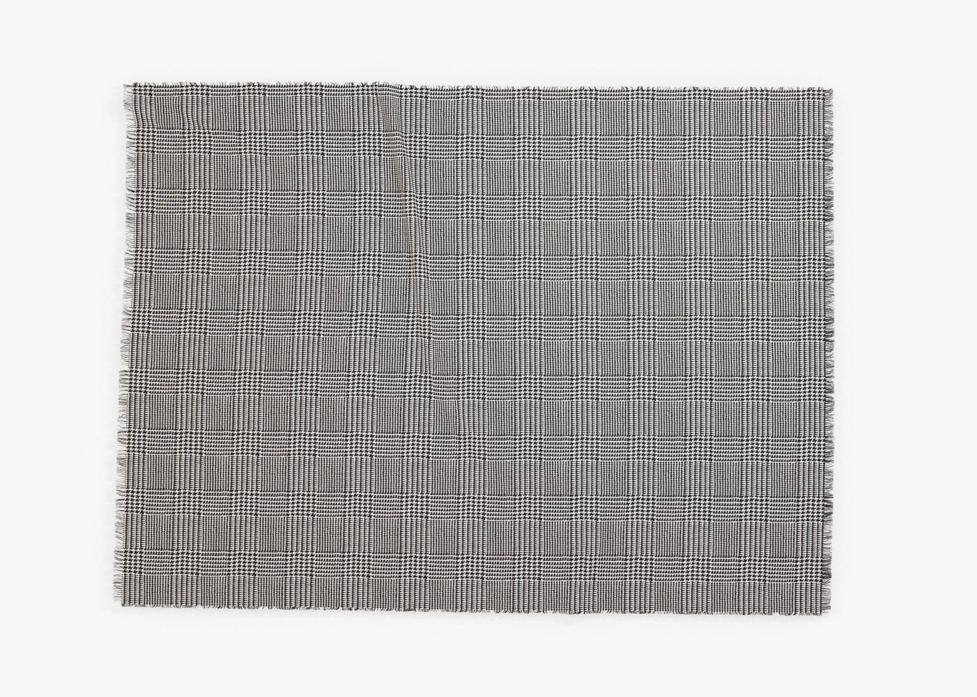 Outdoor bug shield throw blanket in Houndstooth pattern, shown unfolded. #color_Houndstooth